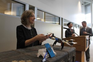 Dr. Stephanie Shanblatt showing off items that will be placed in the time capsule. Credit: Tom Sofield/NewtownPANow.com