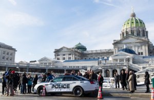 Officials show off an ALPR system that could be funded through the saving created by phasing out registration stickers. Credit: State Of PA