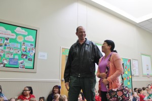 U.S. Army Maj. Patrick Biggs and Capt. Beini Bao as they were greeted Tuesday.  Credit: Tom Sofield/NewtownPANow.com