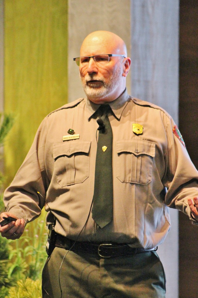 A park ranger speaks to a crowd.  Credit: Tom Sofield/NewtownPANow.com
