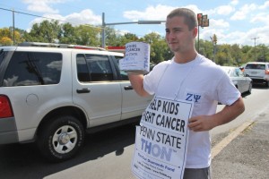 Brock Kauffman, 20, of Lancaster, was among the dozens of Penn State students to collect money for the THON fundraiser in 2013. Kauffman was stationed along Bristol-Oxford Valley Road in Levittown. Credit: NewtownPANow.com