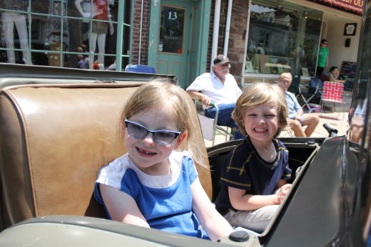 Grace Arner, 6, and Luke Arner, 4, of Richboro check out the back of a classic car.  Credit: Tom Sofield/NewtownPANow.com