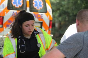 A medic checks the vital signs of a firefighter. Credit: Tom Sofield/NewtownPANow.com