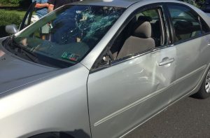 The damage the car after it was struck by a deer. Credit: Newtown Borough Police Department