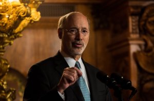 Wolf speaking on the budget Sunday afternoon in Harrisburg. Credit: State of PA