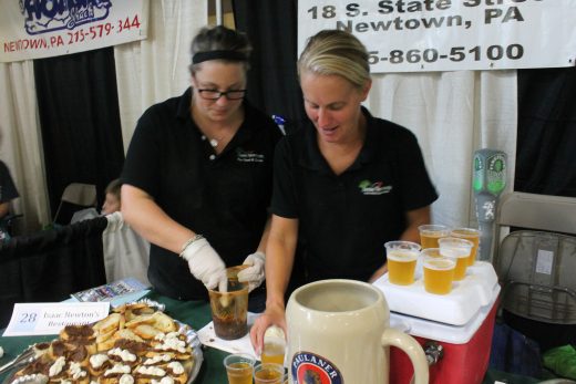 The crew from Issac Newton's served up food and beer. Credit: Tom Sofield/NewtownPANow.com