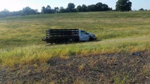 The stolen pickup truck crashed off the I-95 ramp. Credit: Louis Carl Peggs Jr.