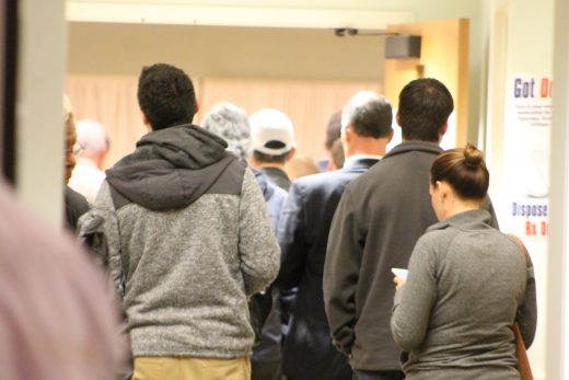 Voterrs waiting in line outside the Newtown Township building Tuesday evening. Credit: Tom Sofield/NewtownPANow.com