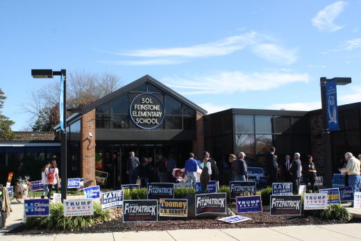 A crowd is present waiting to vote outside Sol Feinstone Elmentary School. Credit: Ingrid Sofield/NewtownPANow.com