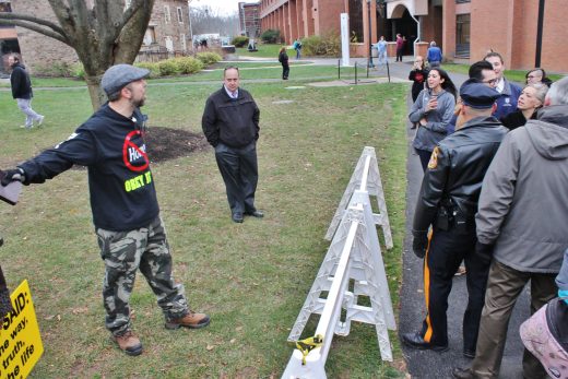 The demonstrator squares off with a Muslim student who is calmed by college staff. Credit: Tom Sofield/NewtownPANow.com
