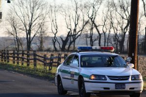 A park ranger sits watching over a entrance to Tyler State Park, which is closed for a deer hunt, in the Richboro section of Northampton Wednesday morning. Credit: Tom Sofield/NewtownPANow.com