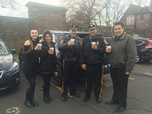 Students gave coffee to police.  Credit: Matt Kelly