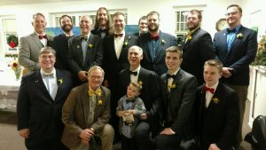 His sons, grandsons and great-grandson honored Fred Guenther by wearing his signature bowties and boutonnieres at his memorial service. Credit: Submitted
