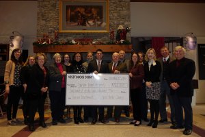 Officials post with a cereimonal check for the grants. Credit: Visit Bucks County